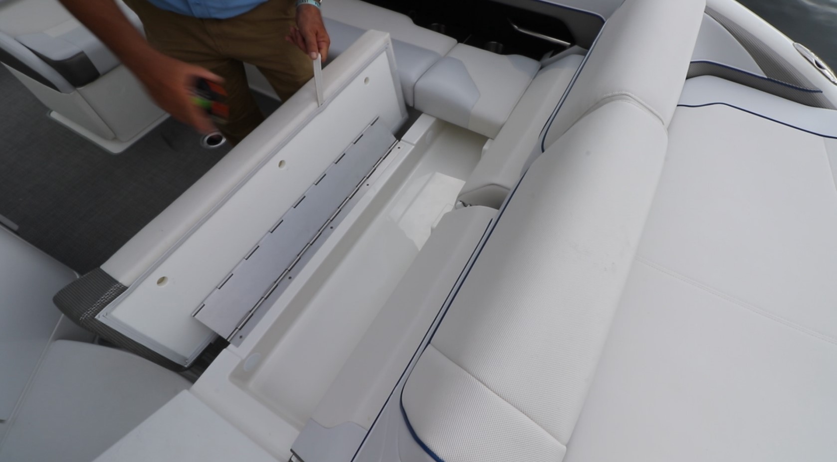 Forward cockpit seat storage