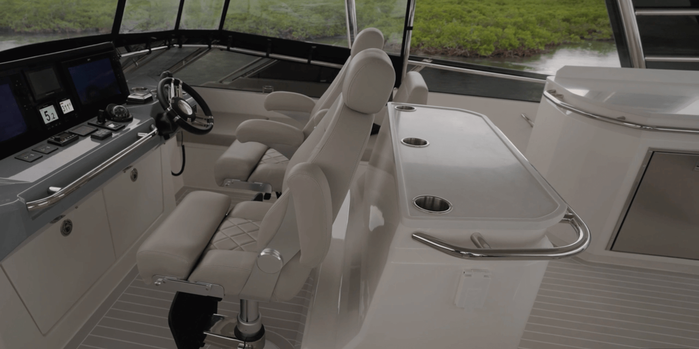 Aquila 50 helm seats and island cabinet