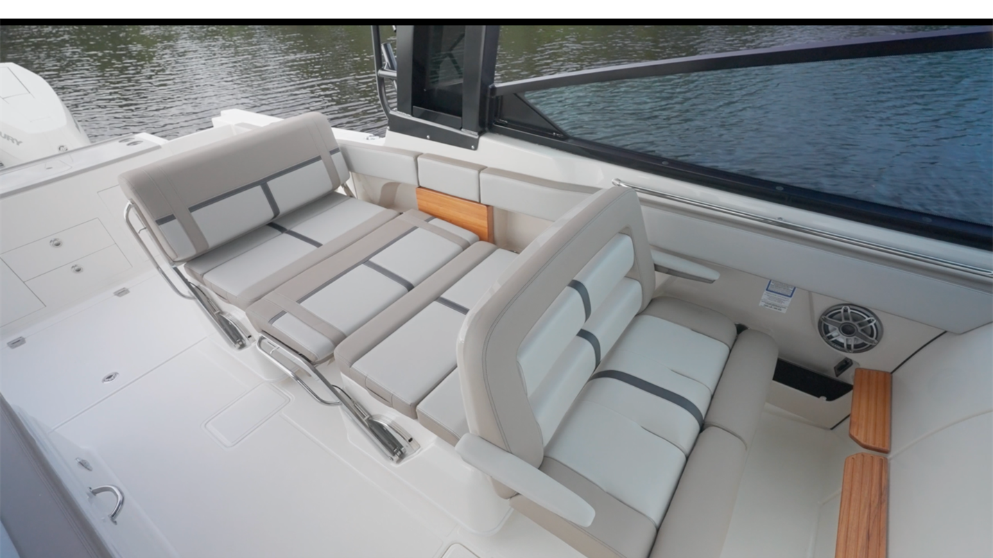 Boston Whaler 330 Vantage with seats configured the space becomes a large lounge area