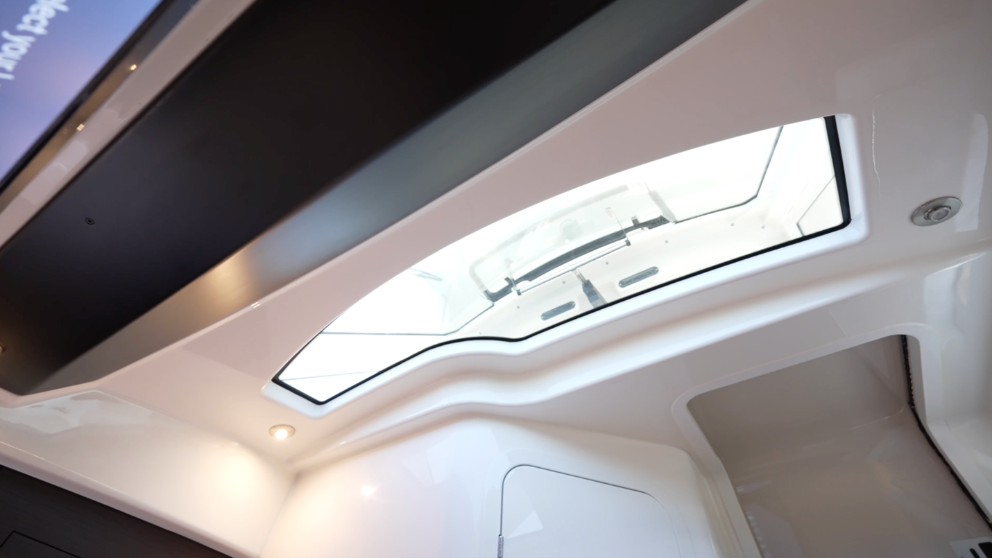 Boston Whaler 350 Realm Ambient light is provided by the overhead skylight