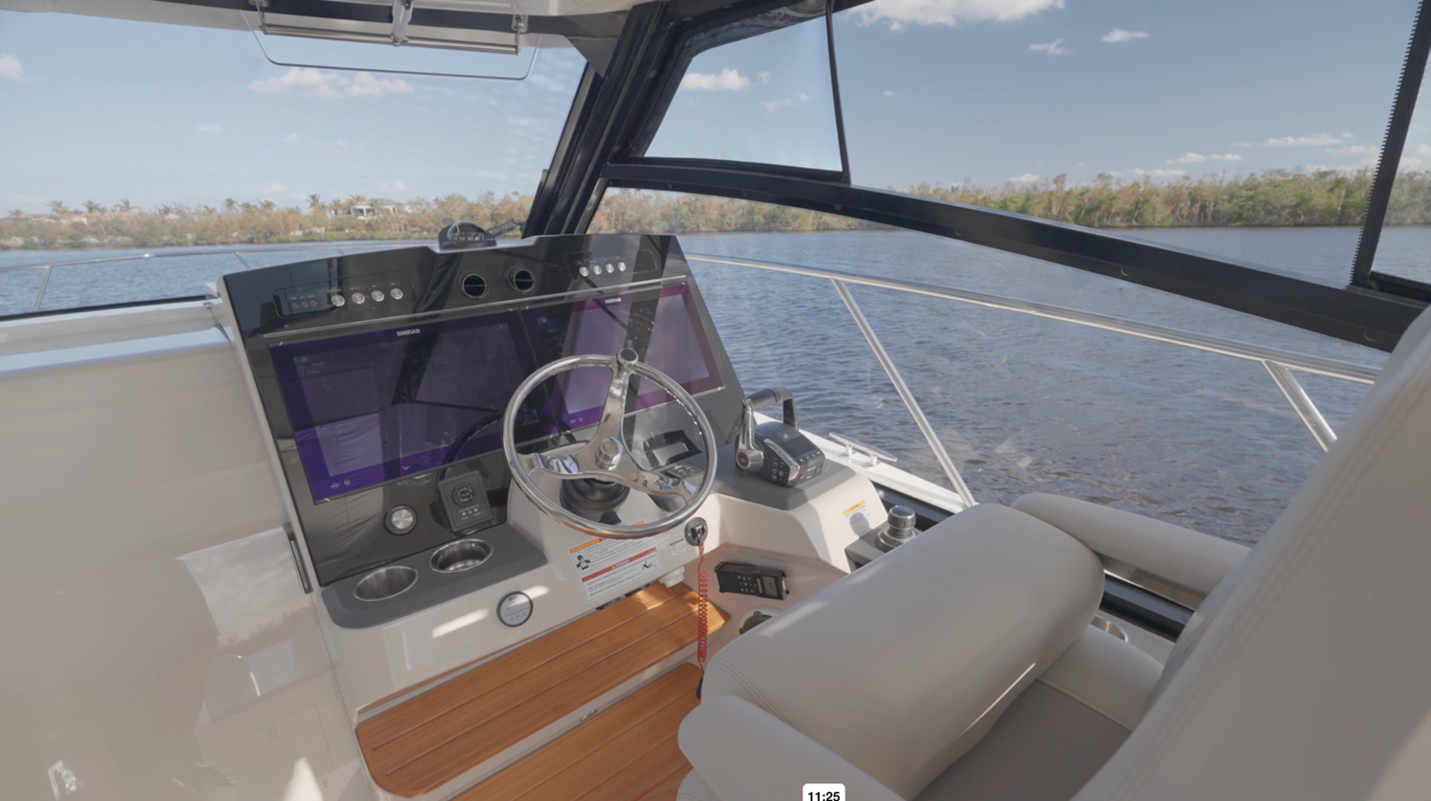 Boston Whaler 365 Conquest helm with abundant console space