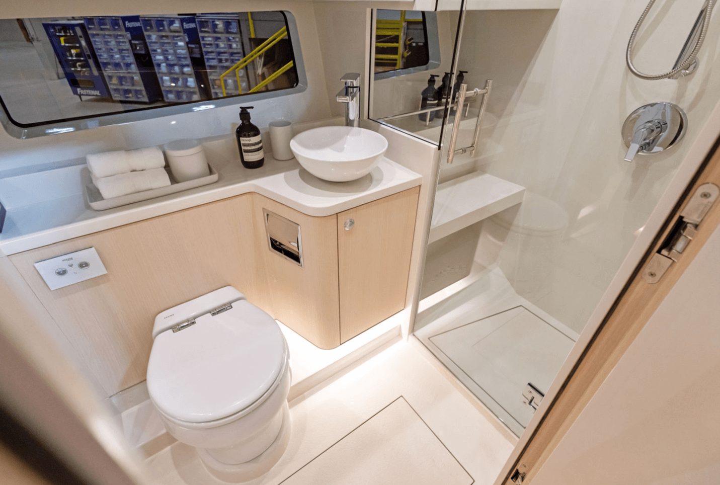 Scout 670 LXS The head includes an electric-flush toilet and fully enclosed shower as well as a vessel sink
